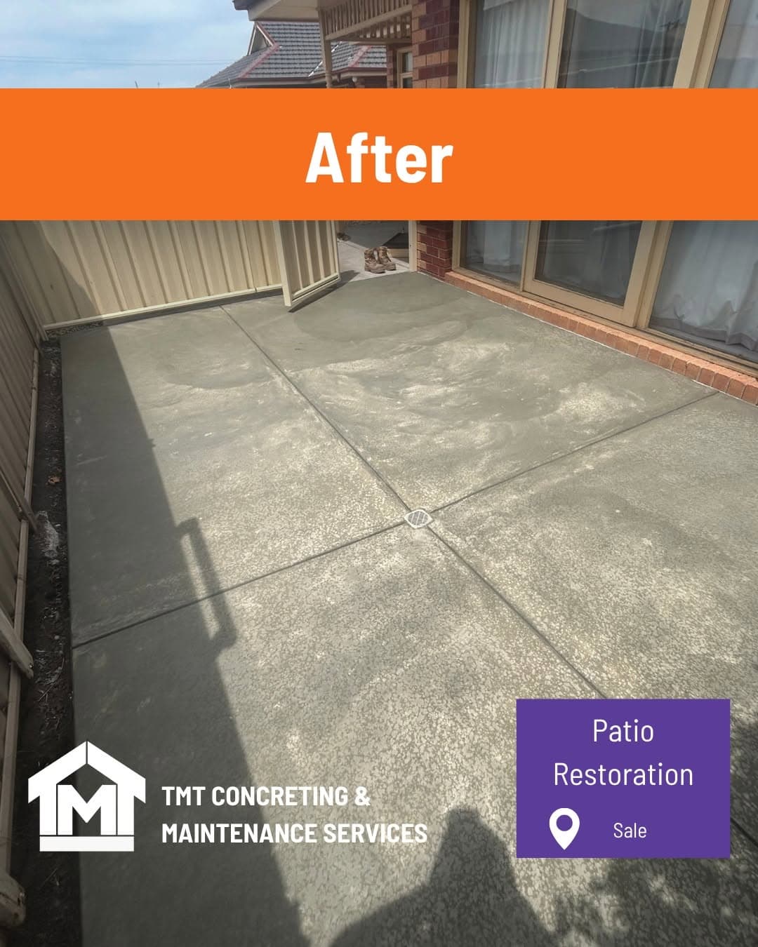 Smooth plain concrete patio slab with central drain beside a brick home, Sale