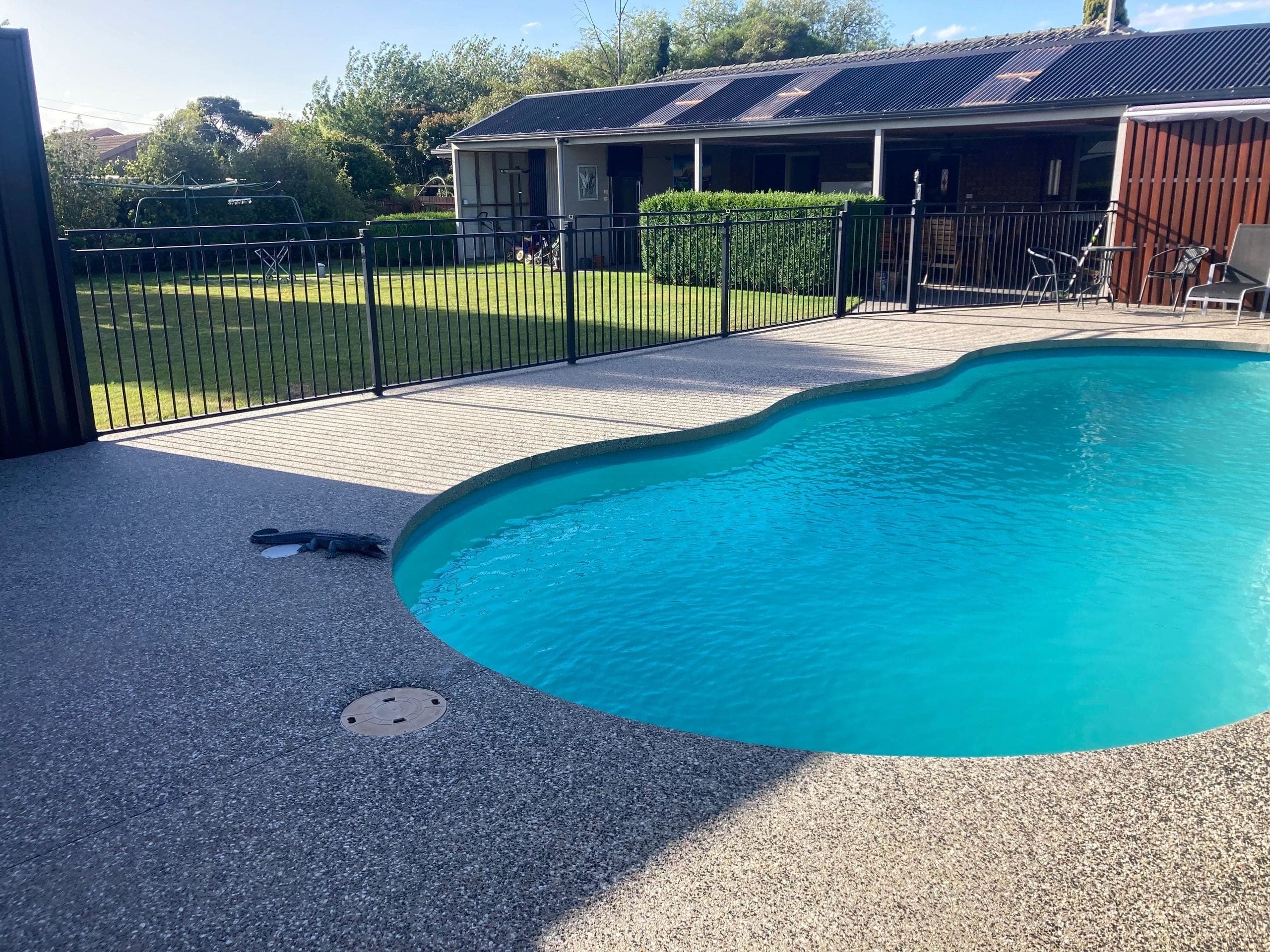 Exposed aggregate pool surround · Maffra · TMT Concreting & Maintenance